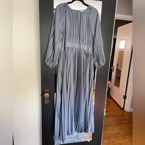 Dainty Jewell’s pleated dress